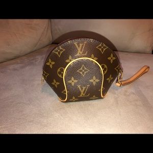 Louis. Vuitton clutch